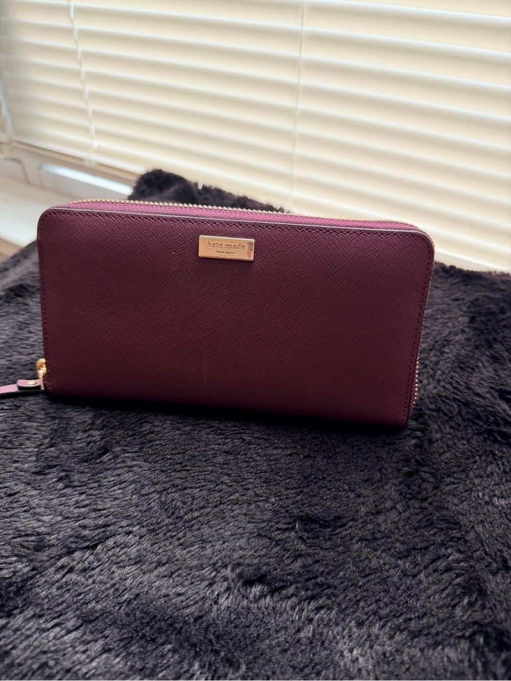 kate spade Plum Zip-Around Continental Wallet with Gold Hardware